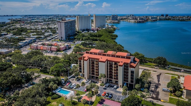 birds eye view of property with a water view