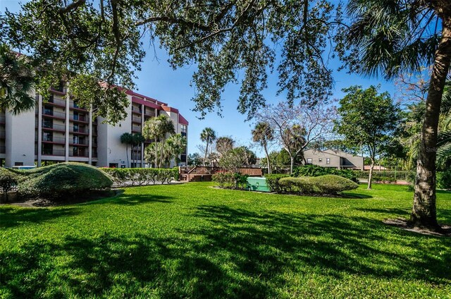 7037 Sunset Dr S Unit 602, South Pasadena, FL 33707 - view of property's community featuring a yard