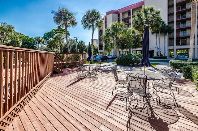 7037 Sunset Dr S Unit 602, South Pasadena, FL 33707 - deck with outdoor dining space