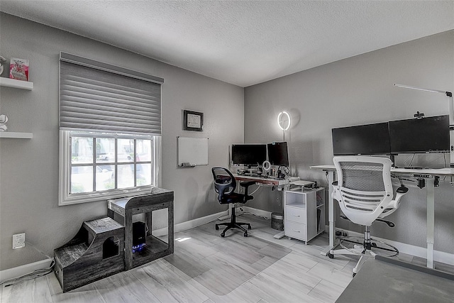 home office with a textured ceiling