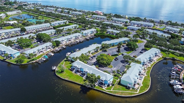 bird's eye view with a water view