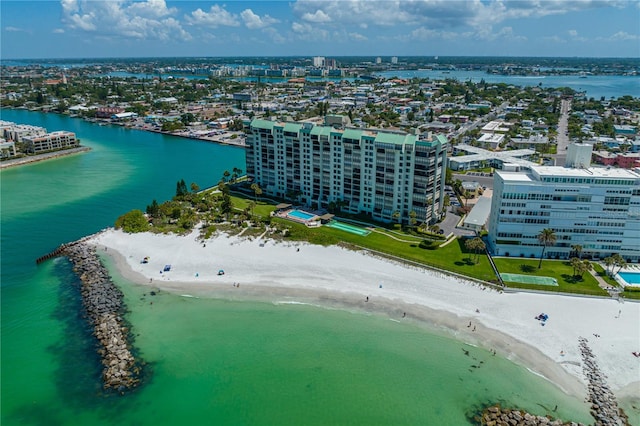 birds eye view of property featuring a view of the beach and a water view