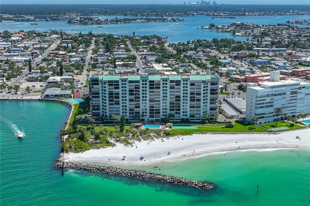 drone / aerial view featuring a view of the beach and a water view