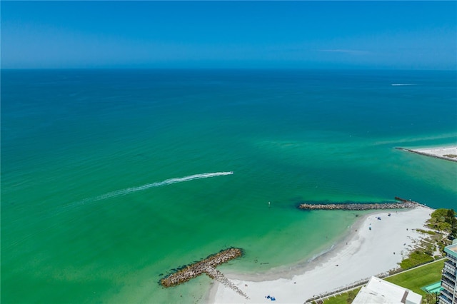 drone / aerial view with a view of the beach and a water view