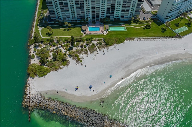 7100 Sunset Way Unit 405, St Pete Beach, FL 33706 - aerial view of extended coastline, a pool area, and apartment complex / building