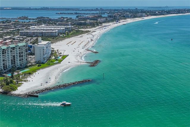 bird's eye view with a view of the beach and a water view