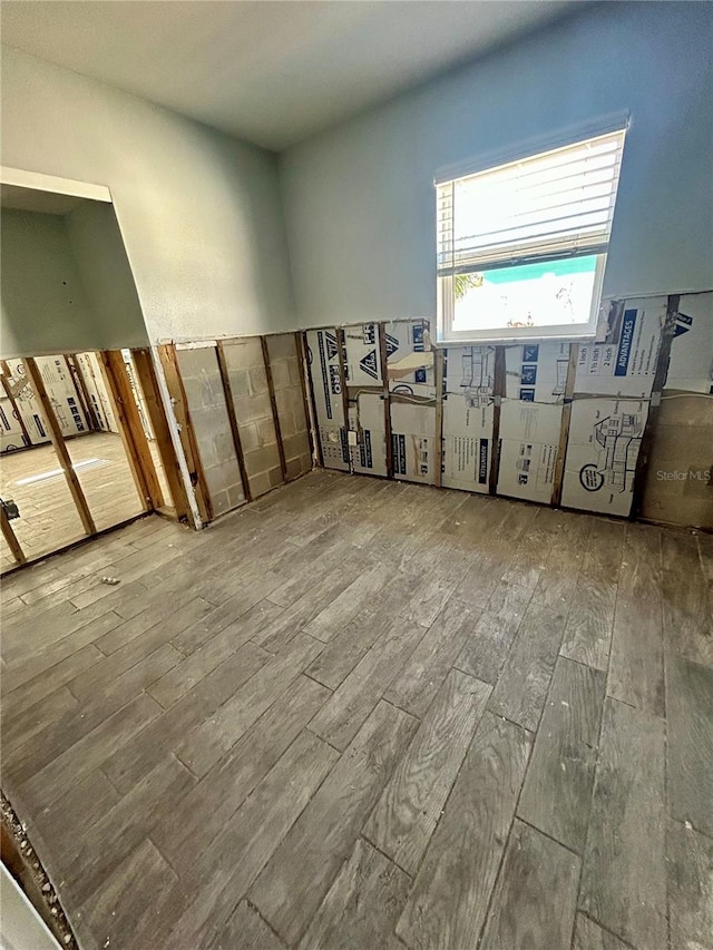 unfurnished room featuring wood-type flooring