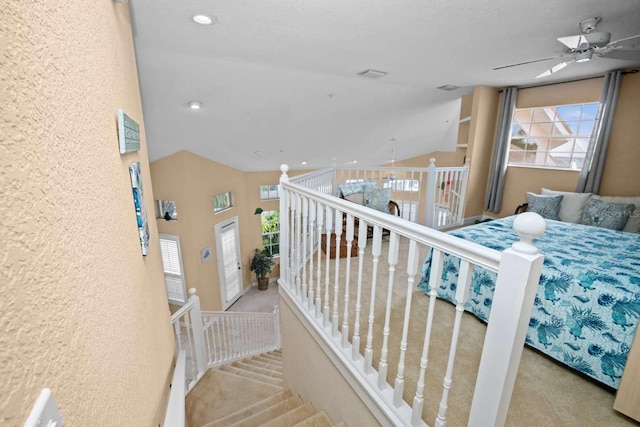 interior space with lofted ceiling and carpet flooring