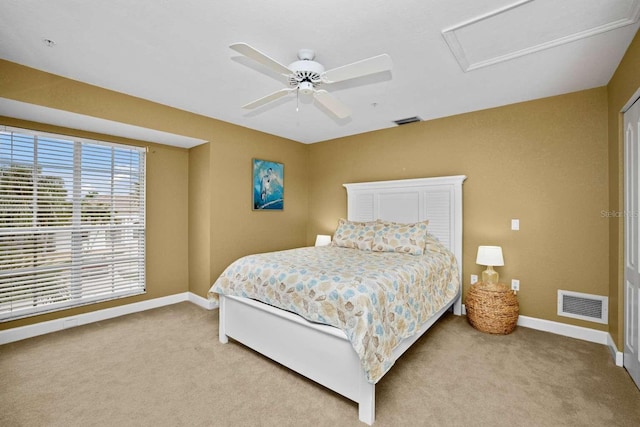 carpeted bedroom featuring ceiling fan