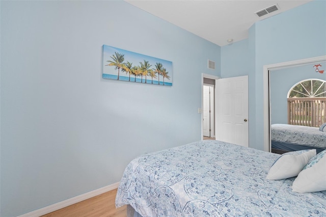 bedroom with light wood-type flooring