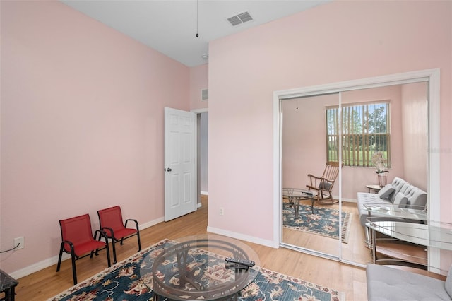 sitting room with light wood-type flooring