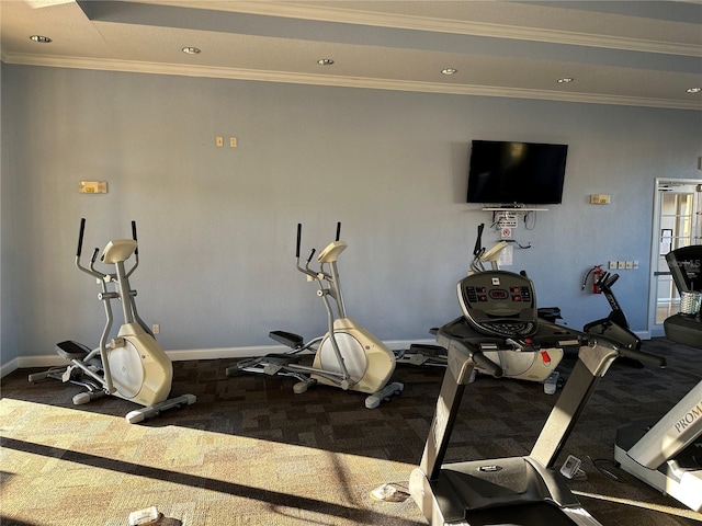 exercise room featuring ornamental molding