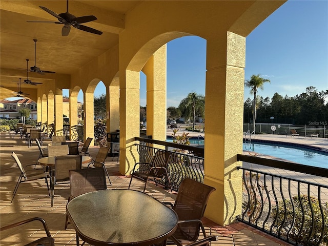 view of patio with a community pool