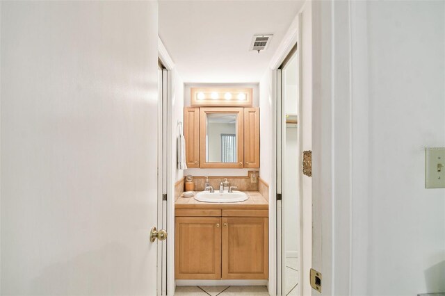 bathroom featuring vanity and tile patterned floors