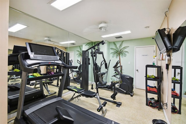 workout area featuring ceiling fan