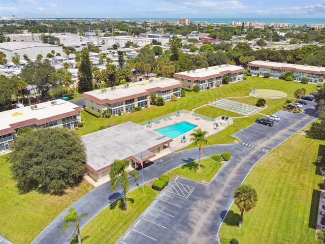 drone / aerial view of a pool