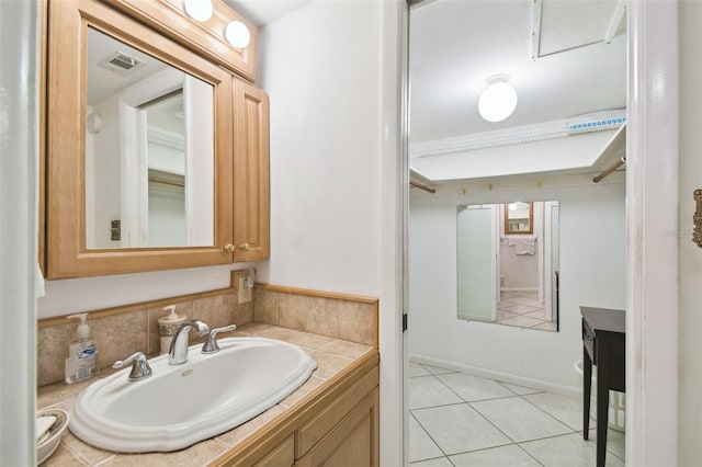 bathroom featuring vanity and tile patterned floors