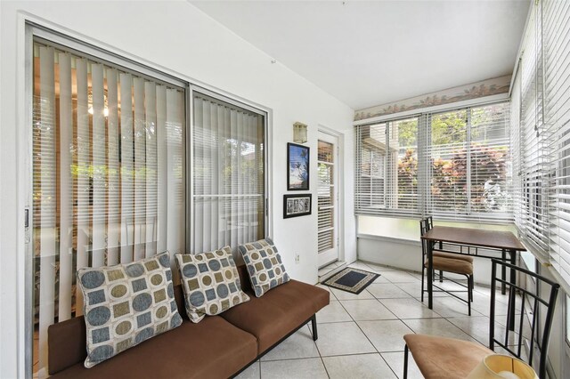 sunroom featuring tile patterned floors