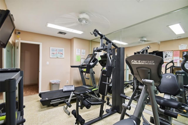 workout area with ceiling fan