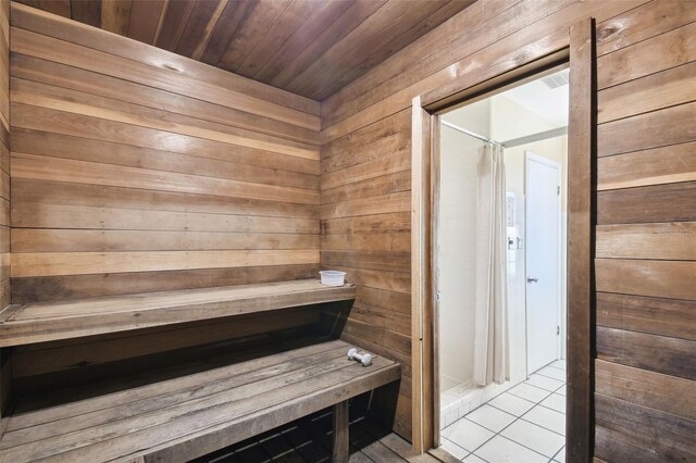 relaxing sauna / steam room with wood walls