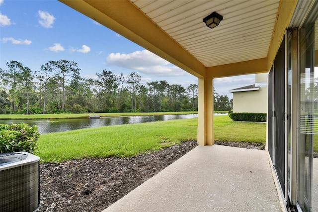 20461 Berrywood Ln, Tampa, FL 33647 - view of patio / terrace with a water view and cooling unit