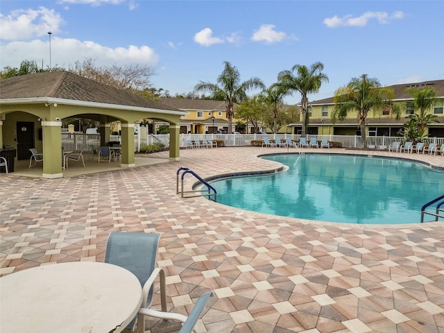 20461 Berrywood Ln, Tampa, FL 33647 - pool featuring fence, a gazebo, and a patio area