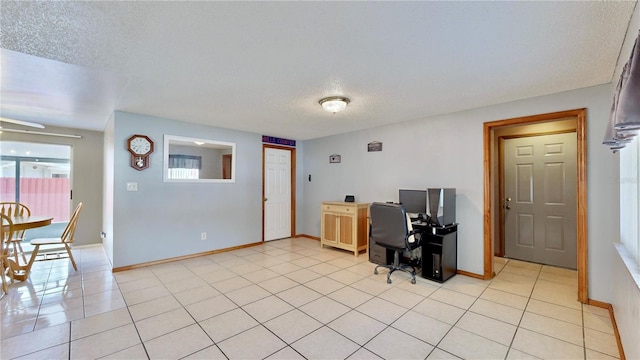 tiled office with a textured ceiling