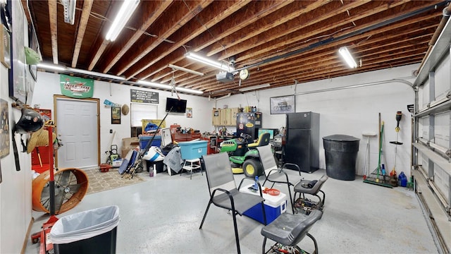 garage with black refrigerator