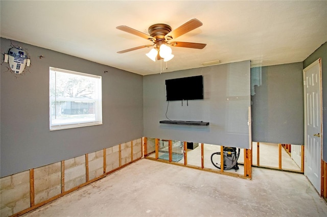 interior space featuring ceiling fan