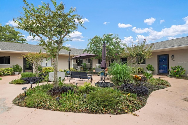 exterior space with a patio