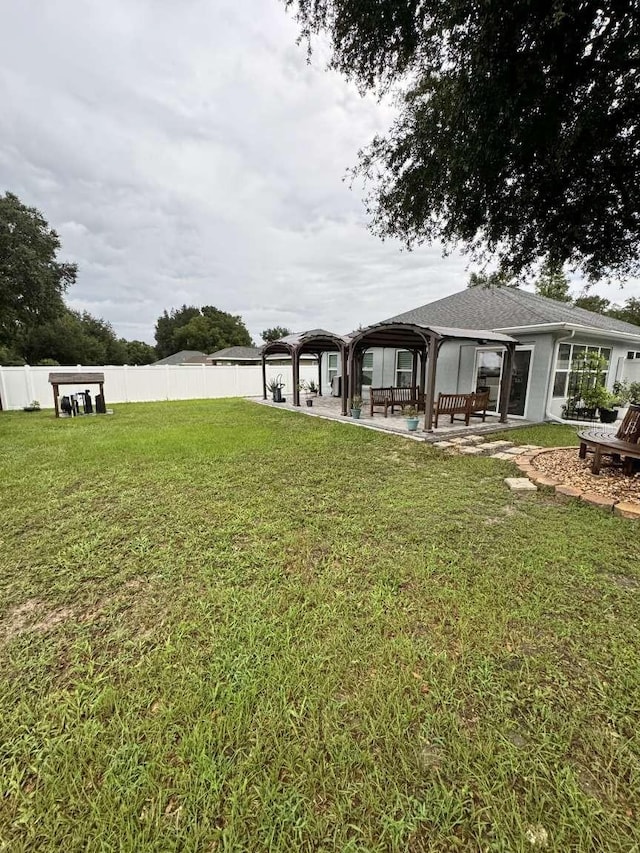 view of yard featuring a gazebo and a patio