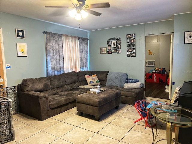 tiled living room featuring ceiling fan