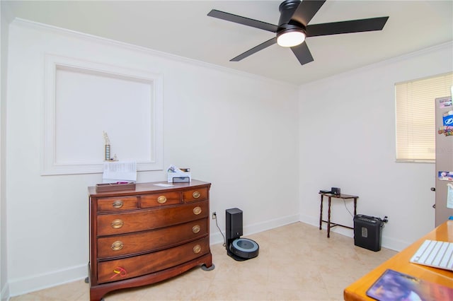 interior space with ceiling fan and ornamental molding