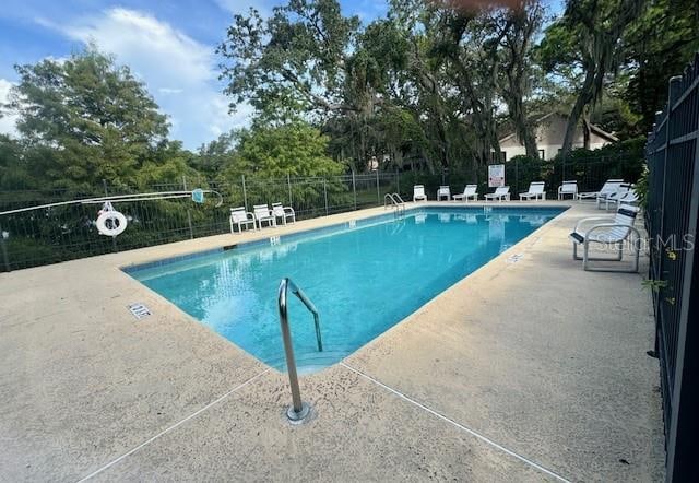 view of pool with a patio