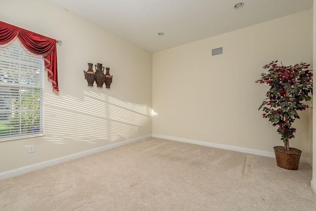 view of carpeted spare room