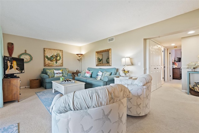 living room with light colored carpet