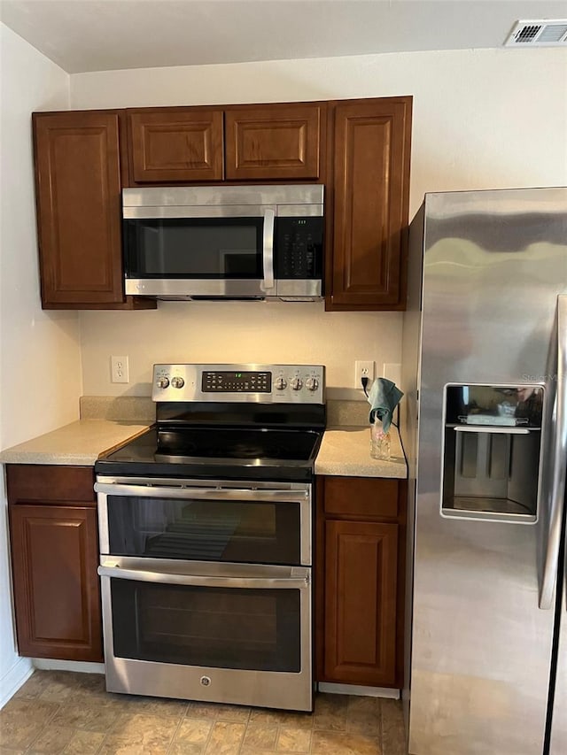 kitchen featuring appliances with stainless steel finishes