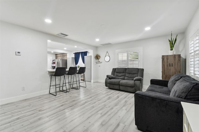 living room featuring light hardwood / wood-style floors