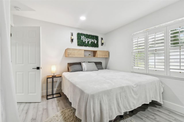 bedroom featuring light hardwood / wood-style flooring