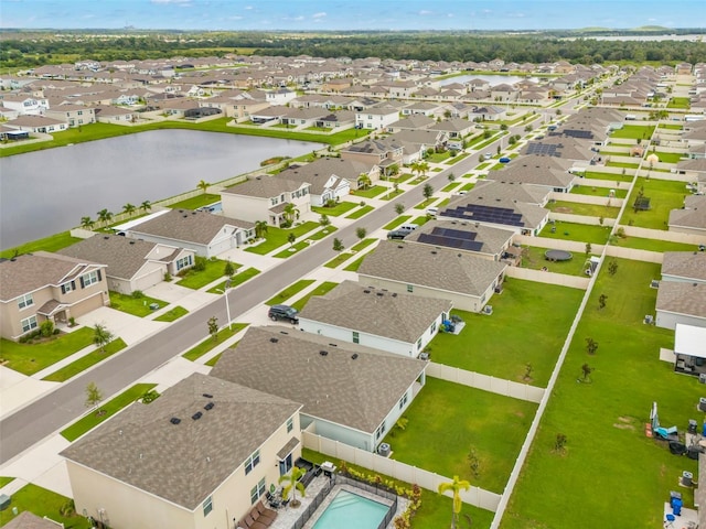 drone / aerial view with a water view