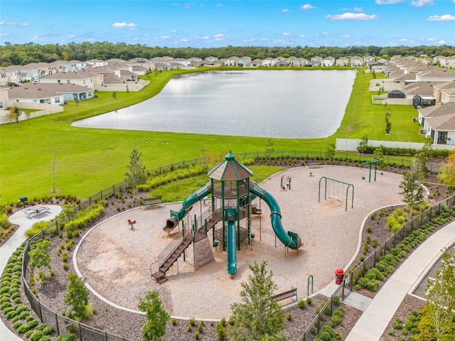 birds eye view of property featuring a water view