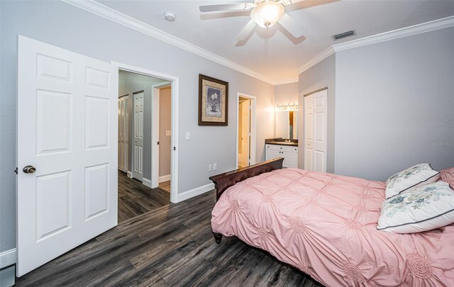 bedroom with crown molding, dark hardwood / wood-style flooring, connected bathroom, and ceiling fan