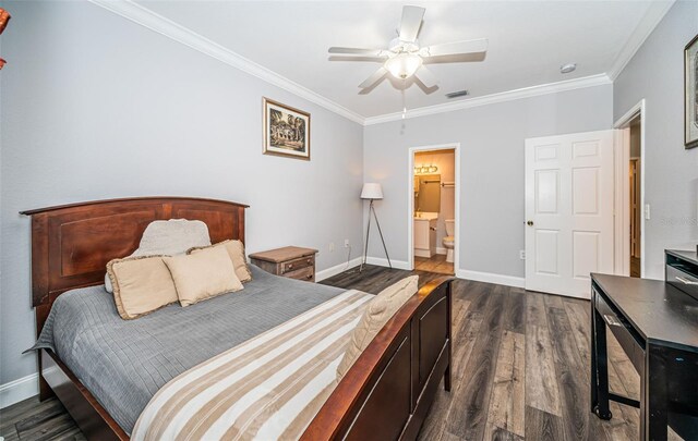 bedroom with ornamental molding, ensuite bathroom, ceiling fan, and dark hardwood / wood-style floors