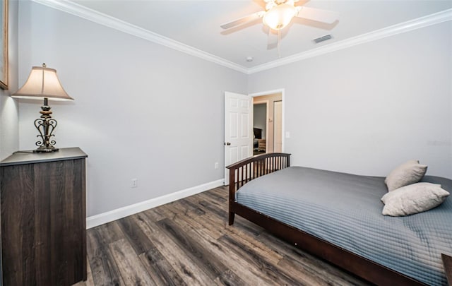 bedroom with dark wood-type flooring, ceiling fan, and ornamental molding