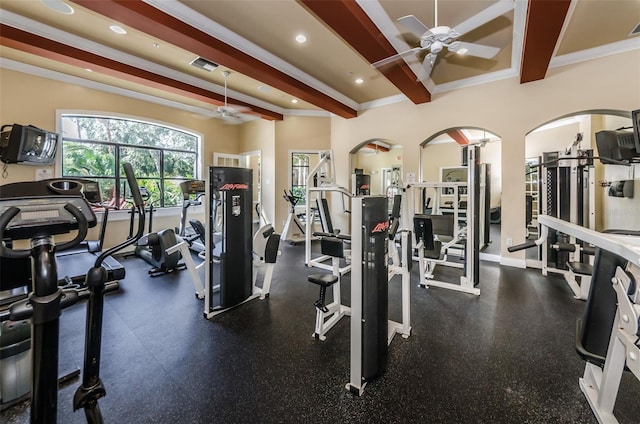 workout area with ceiling fan and ornamental molding