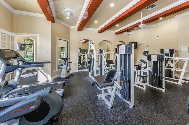 exercise room with ceiling fan and ornamental molding