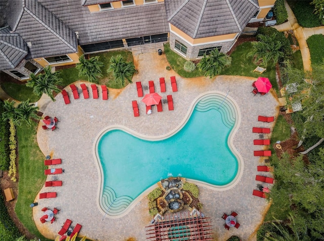 view of swimming pool featuring a patio