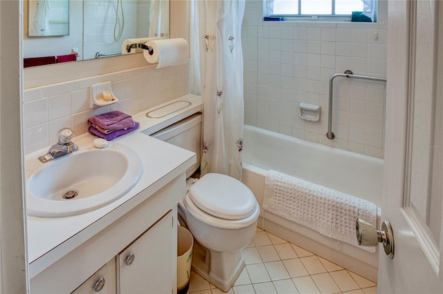 full bathroom with vanity, shower / tub combo, toilet, tile patterned floors, and decorative backsplash