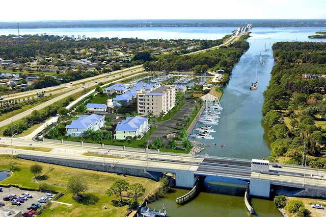 birds eye view of property featuring a water view