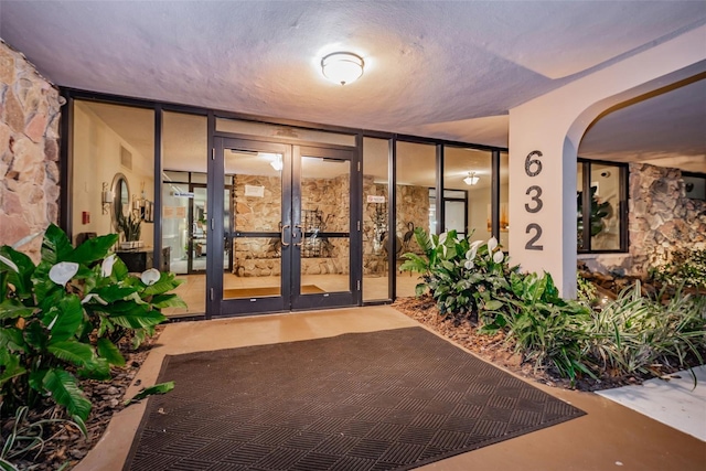 doorway to property featuring french doors